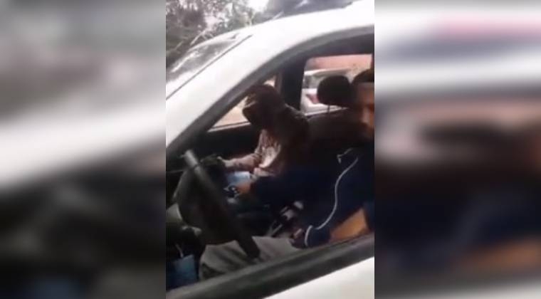 Employees of a workshop are filmed in a patrol car making fun of the Police