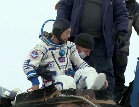 A Japanese billionaire and his assistant return to Earth after 12 days on the ISS