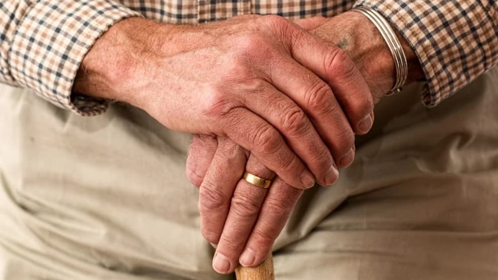 Older adult collects 100,000 signatures for banks to attend to them in person