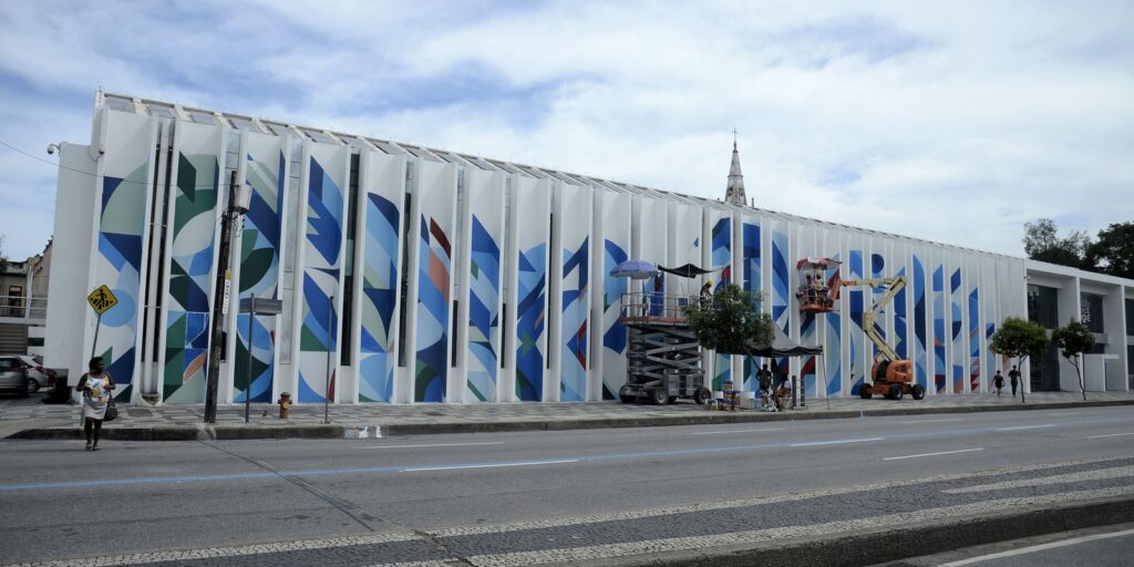 In Rio, graffiti artists paint the facade of the Biblioteca Parque Estadual