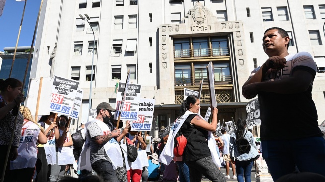 Protesters from left-wing organizations march towards Labor in downtown Buenos Aires