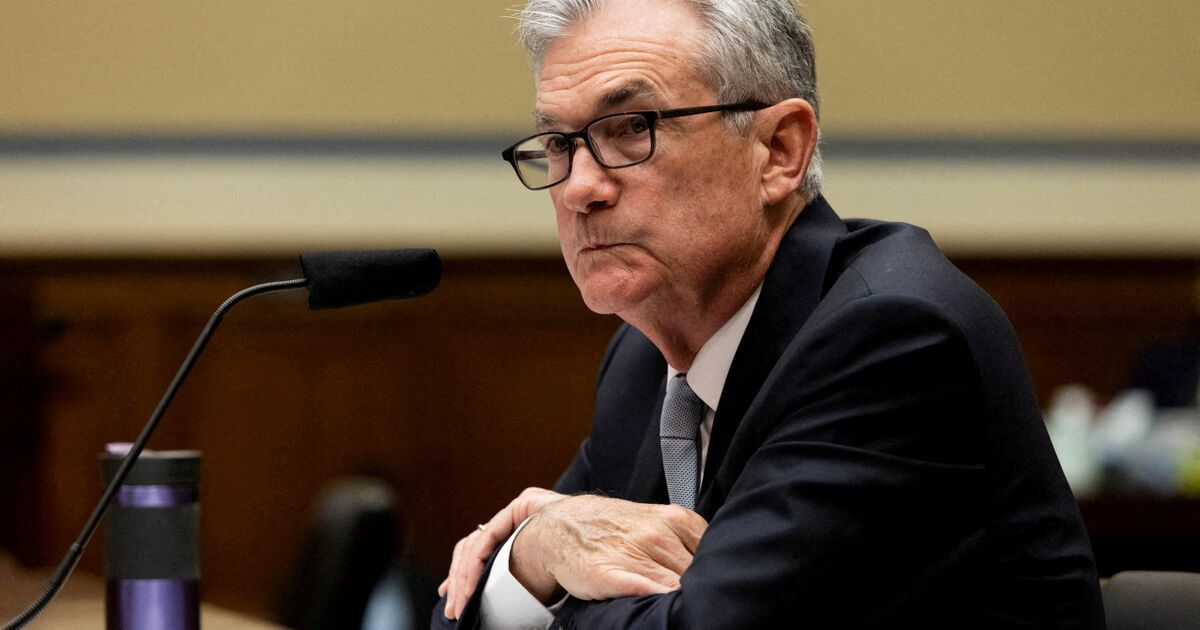 The Fed raises its interest rate and cuts growth forecast for the US