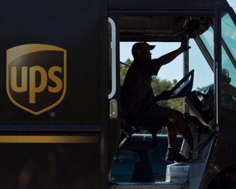 UPS reports quarterly earnings above expectations