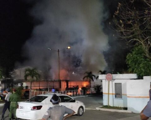 A bus catches fire at a bus stop in Havana