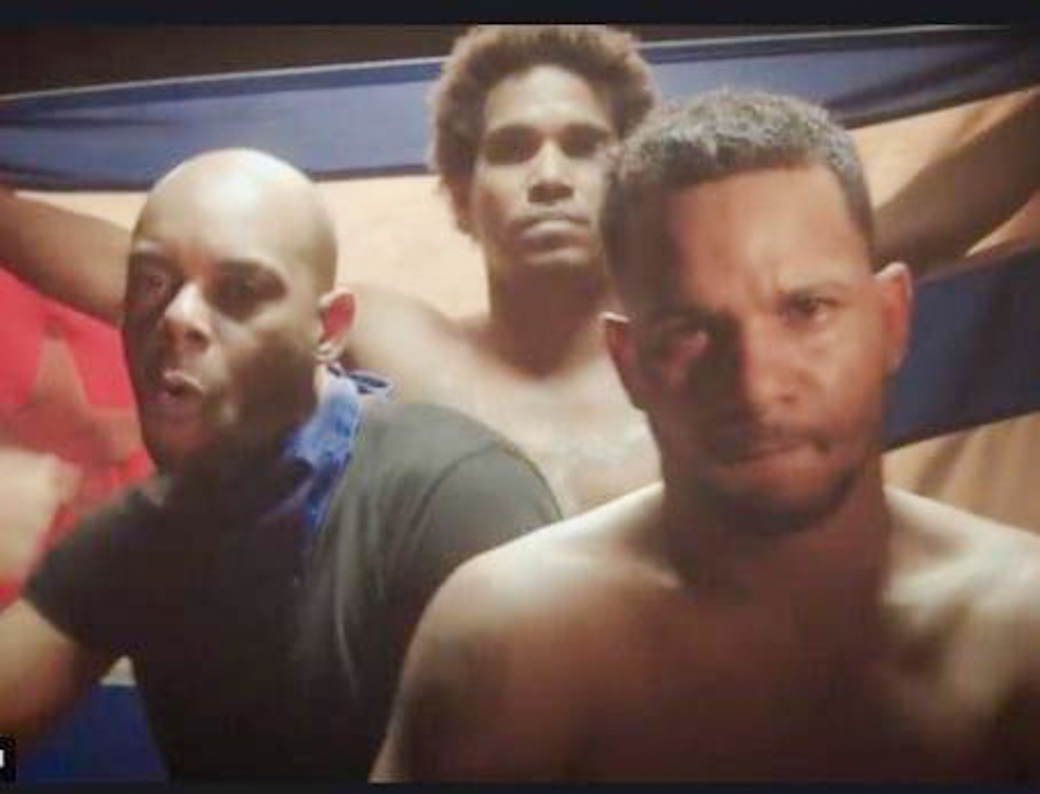 Fotograma del videoclip Patria y Vida en el que aparece Maykel Osorbo (der) junto al Funky y Luis Manuel Otero Alcántara.