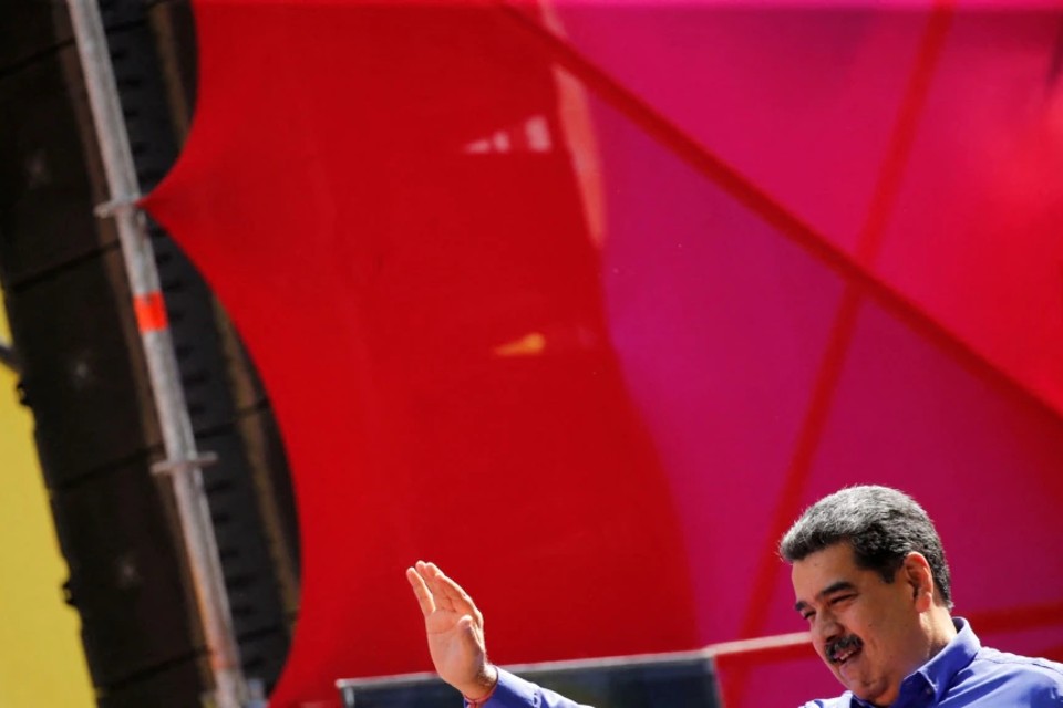 How does Maduro's meeting with the Iranian minister affect his approach to Biden?