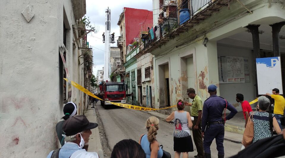 A man is trapped after the staircase of the building where he lives in Old Havana collapses