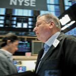 Wall Street turns red;  investors brace for inflation data