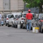 Charged parking confronts car attendants with the Municipality of Asunción