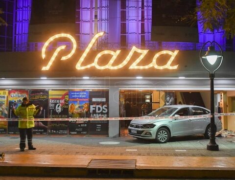 One of the women run over at the door of the theater in Mendoza remains serious