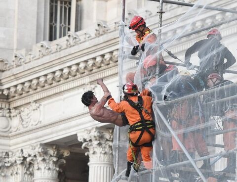 They rescued a former police officer who threatened to throw himself from a scaffolding