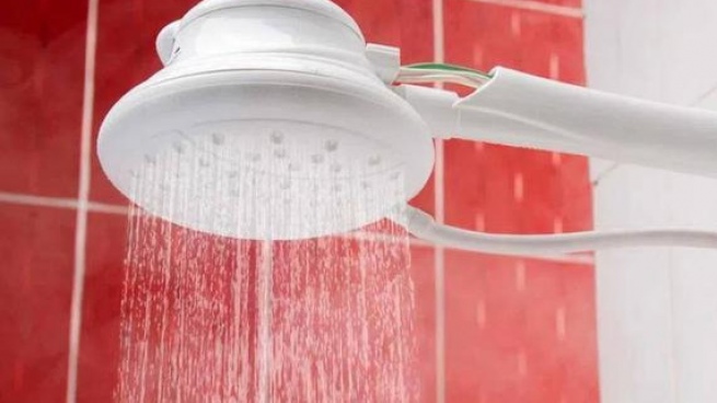 A woman died from the discharge of an electric shower