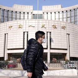 The Central Bank of China lowers interest rates to stimulate its economy