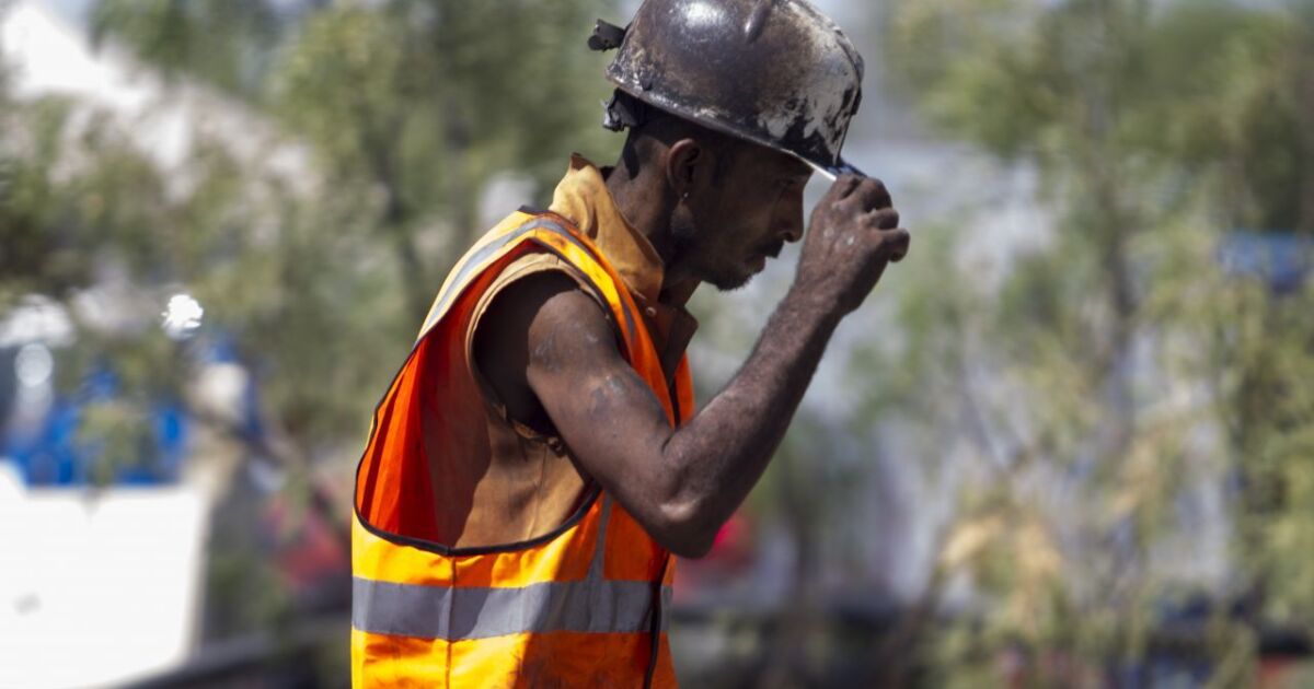 A month after the collapse, families of trapped miners celebrate mass in Sabinas