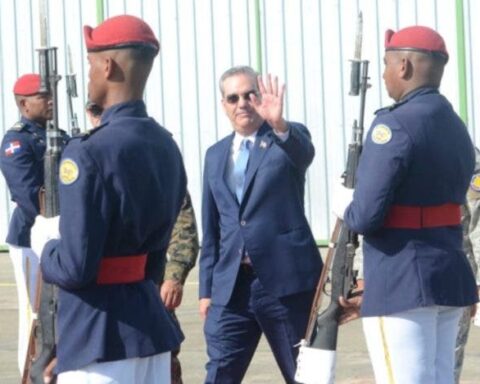 President Luis Abinader waves as he walks to the plane that will take him to Washington for a meeting with Vice President of the United States Kamala Harris