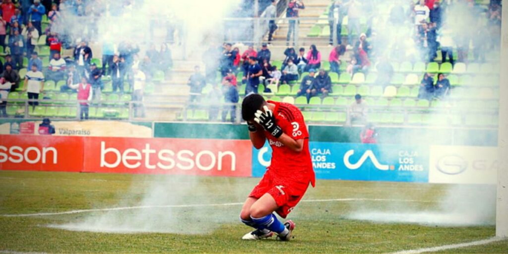 Commotion in Chile!  A goalkeeper, hit by firecrackers