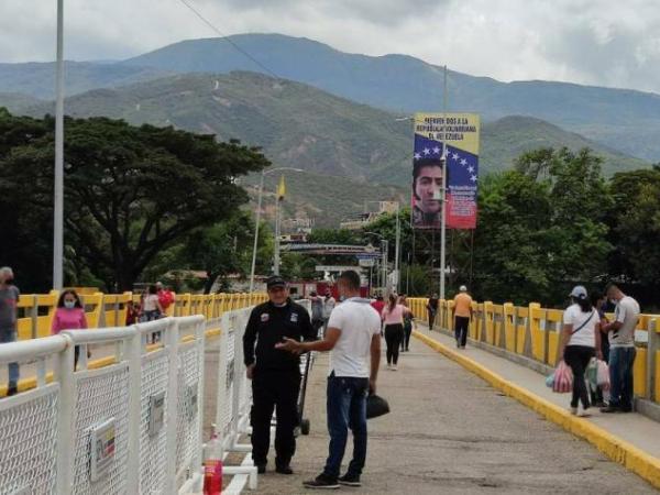 List the date of reopening of the border between Colombia and Venezuela