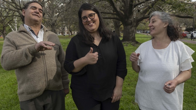 Neither deaf nor hearing, the children of deaf people feel part of both communities