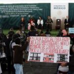 Relatives of victims of dirty war in Mexico enter a military camp