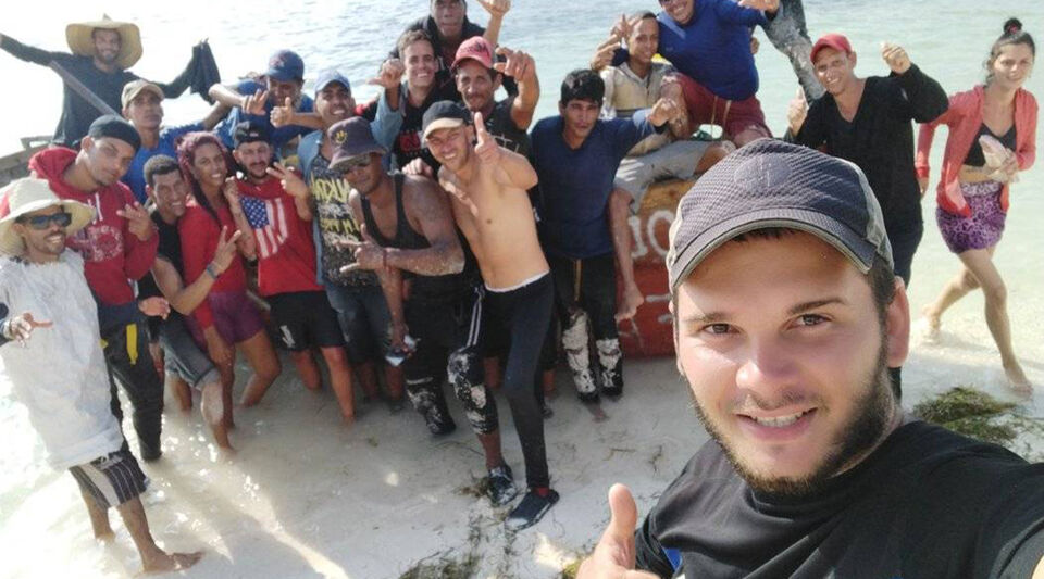 A Cuban films the arrival of a group of rafters to an uninhabited island in the US