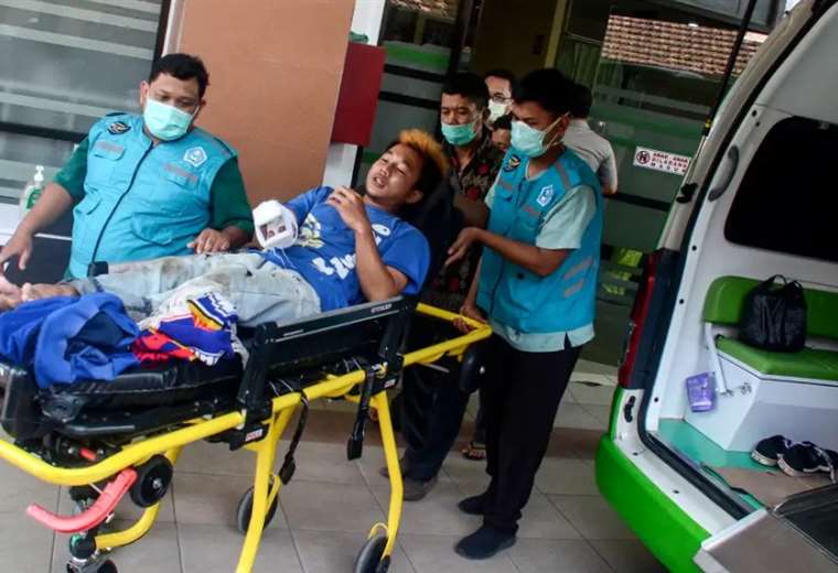 Anguish and tears for relatives and survivors of the stampede in Indonesia