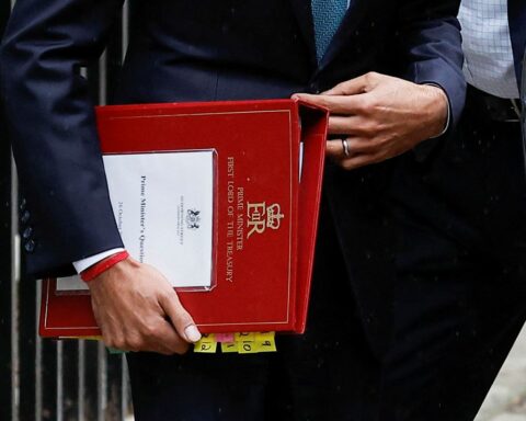 British PM announces he will postpone budget presentation