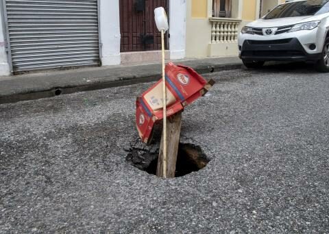 Neighbors say sinkhole is formed after earthquake