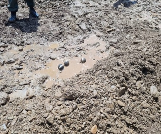 Three grenades recovered from the rubble of Las Tejerías