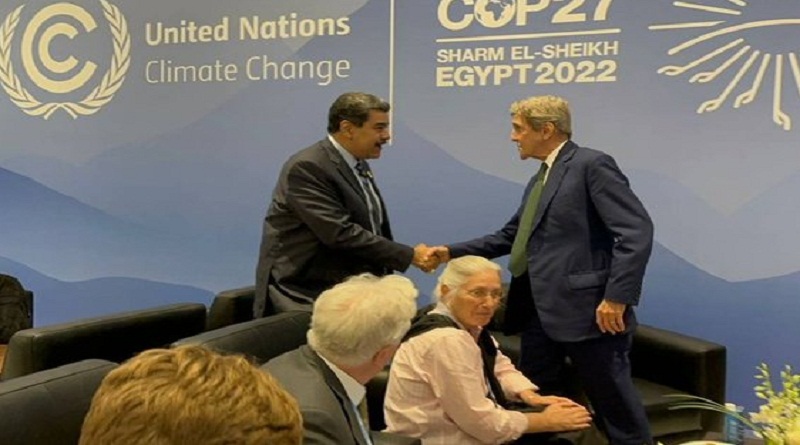 Maduro and John Kerry greet each other during COP27