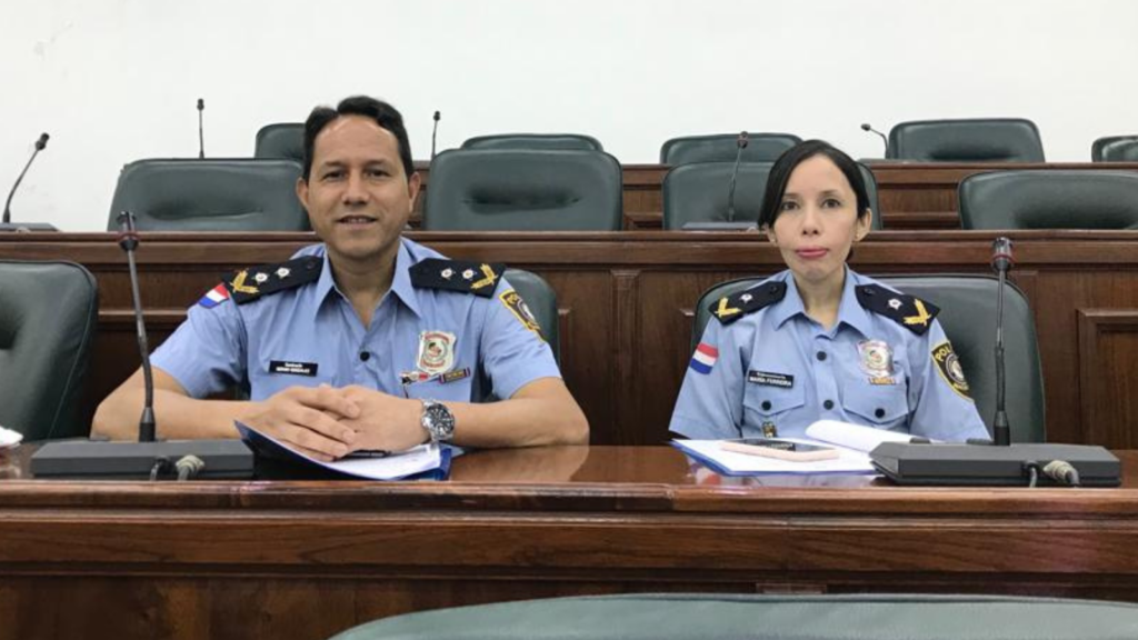 Police officers participate in a public hearing on the Bill against street sexual harassment