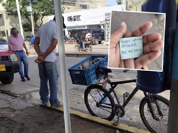 "To give his children the best in December," a bricklayer hands out cards with his cell phone number to look for a job