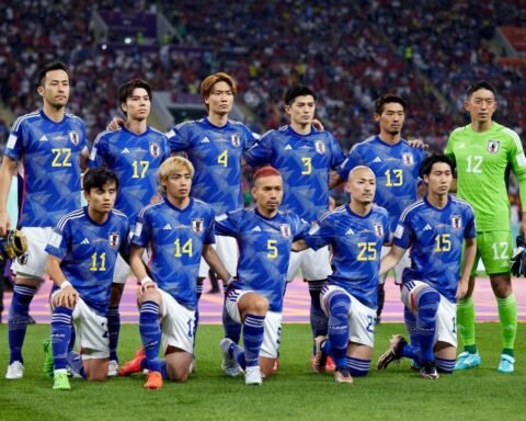 Japan passes as group first