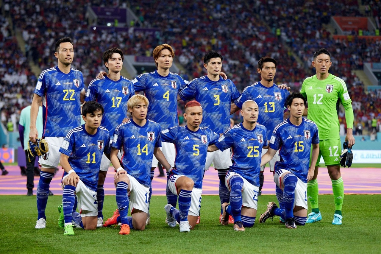 Japan passes as group first