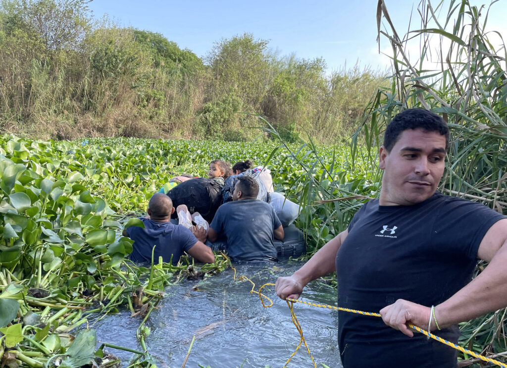 Migrants in Mexico jump into the Rio Grande to reach the United States