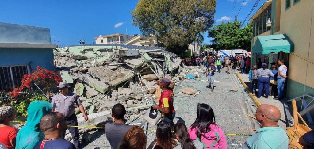 Body of woman trapped under rubble found in collapsed building