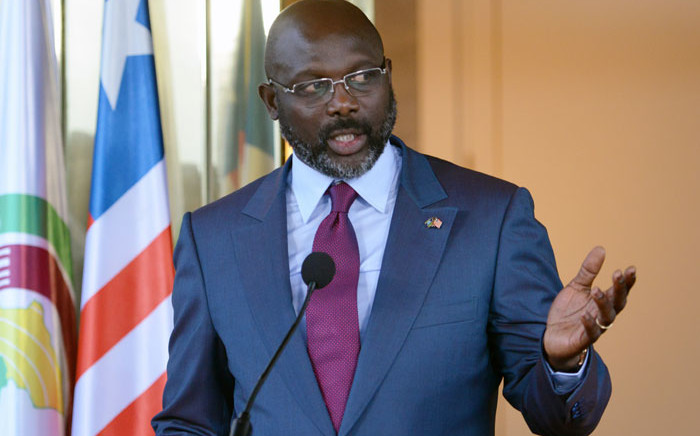 George Weah will seek a second term in the October elections in Liberia