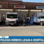 Injured police officers are transferred to the Pisco hospital after clashes with protesters
