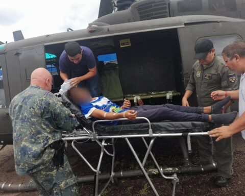 An FTC helicopter transports an indigenous person bitten by a snake