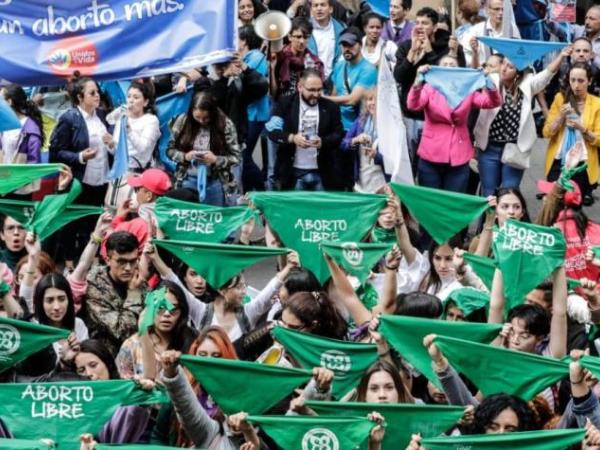 Colombia waves its green handkerchiefs a year after legalizing abortion