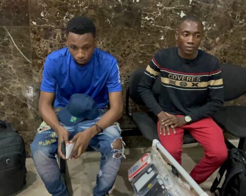 Police strip Haitian vendors of money and documents