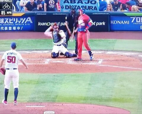 A beat up racing and billboards for the Cuban baseball team in Miami