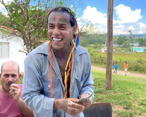 Rapper Tekashi 6ix9ine hands out $100 bills in a town in Cuba