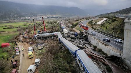 The death toll from a collision between trains rises to 38 and the station manager was arrested