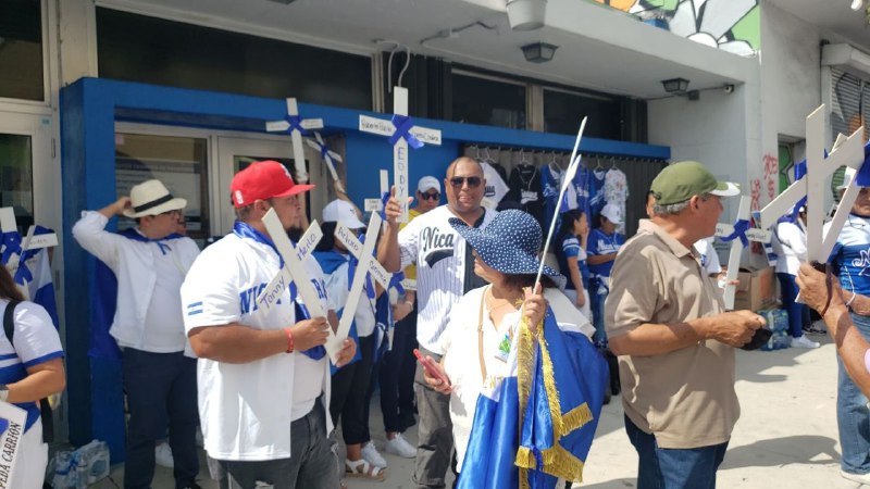 Opponents marched in Miami, commemorating five years of civic struggle