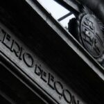 What happened to the fiscal deficit in the 12 months ending in April?