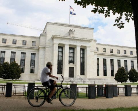 Fed holds rates, points to possible cut in September