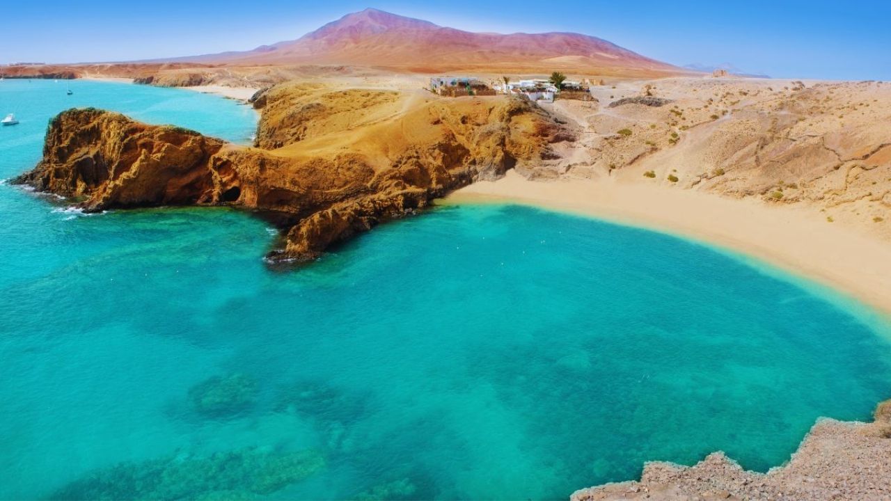 What is the beach with turquoise water and white sand that is in the south of Chile and few people know about?