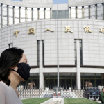 Chinese central bank cuts two key rates to stimulate economy