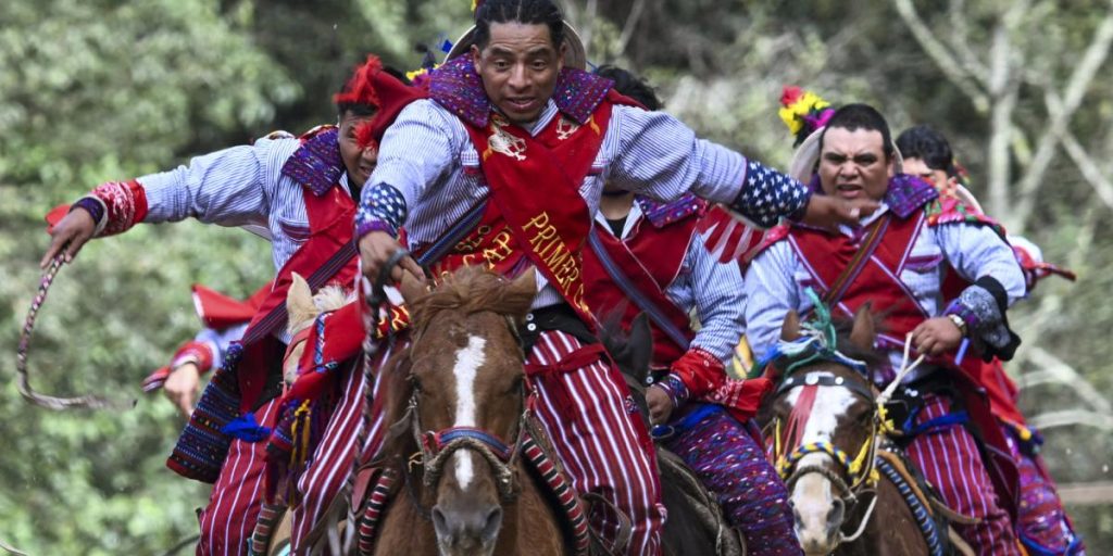 Day of the Dead: Drunken Mayan horsemen brave danger to honor their dead in Guatemala