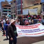 State workers march against the Government asking for the repeal of the law that limits collective agreements